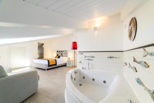 Zia Pupetta Suites - Tap to explore photos