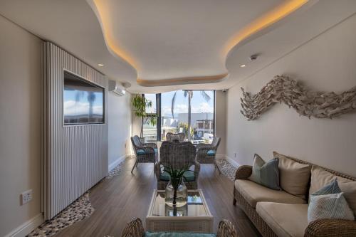 Zajednički dnevni boravak / prostorija s TV-om, Bayview Hotel in Plettenberg Bay