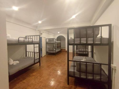 เตียงสองชั้นในห้องพักรวมชาย  (Bunk Bed in Male Dormitory Room )