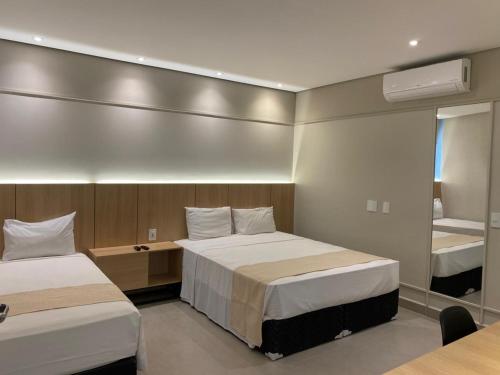 2 queen beds, 1 twin bed