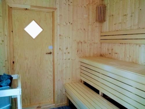 Holiday Home Gepflegtes Ferienhaus mit eigenem Saunahaus by Interhome in วิมเมอบีย์