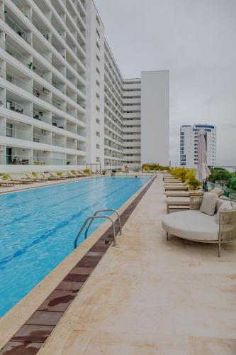 Encantador y moderno estudio con piscina a pasos del aeropuerto
