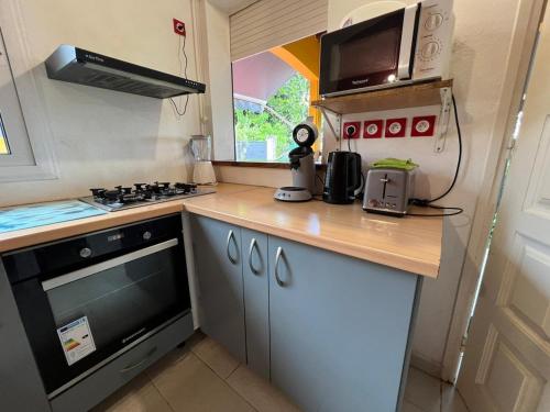 Maison cosy avec jacuzzi - entre Mer & Montagne - 5 Personnes & 1 bebe in Baie-Mahault