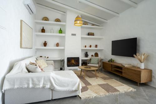 Koplietošanas atpūtas telpa ar TV, Casa Oliva Refugio Rural Contemporaneo in Cabeça Gorda
