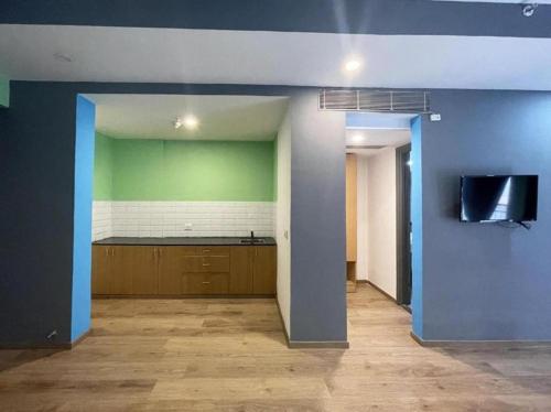 Kitchen, The Roseman Hotel and Suites in Ghaziabad