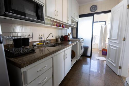 Kitchen, Cobertura Duplex com piscina a 200m da Praia near Steam train pavillion