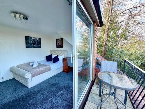 Balcony/terrace, Indoor Heated Pool - Large Family Home - Sleeps 12 - Near Bournemouth Beach in Redhill