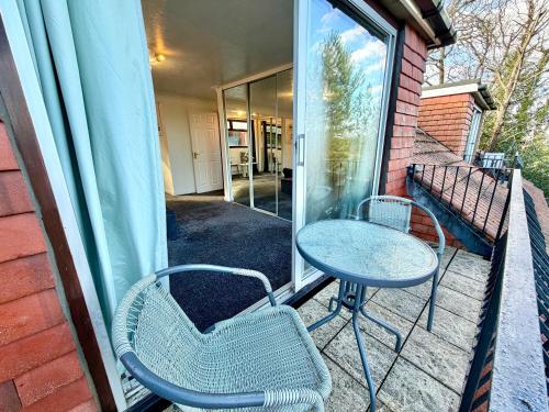 Balcony/terrace, Indoor Heated Pool - Large Family Home - Sleeps 12 - Near Bournemouth Beach in Redhill