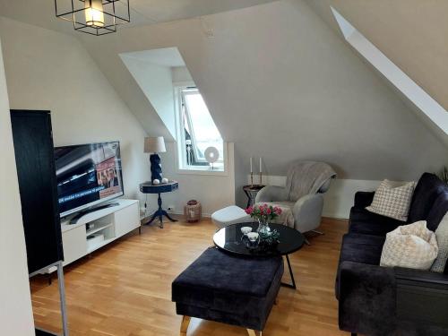 Topp floor apartment with one bedroom & a loft – khách sạn tại Aspoya