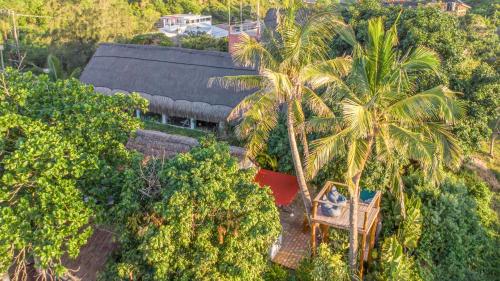 酒店外观, Kitesurf Tofo House - 1 minute walk from beach and center in 伊尼扬巴内