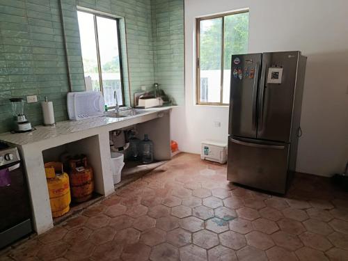 virtuve, Casa 12-87 in Poneloya