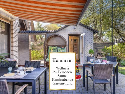 Fewo Kumm rin - Ihre private Nordsee-Oase direkt hinter dem Deich - privater Gartenstrand - Sauna & Kamin - Vieles für den kleinen Gast in Carolinensiel, Deutschland