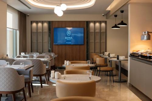 Közös társalgó / TV, Reiwa Business Hotel in Osmaniye