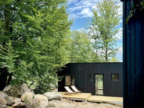 Viesnīcas āriene, Lakeside Cabins In The Forests Near Immeln in Immeln