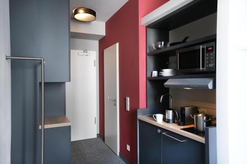 Kitchen, HUB-Apartments in Hamburg