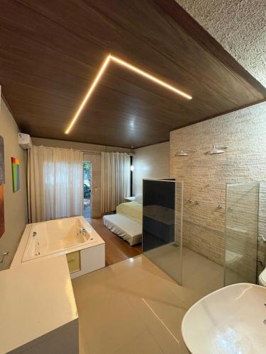 CASA ESPACOSA COM PISCINA AQUECIDA e 5 SUITES COM AR CONDICIONADO in Estância Chácara Itapema