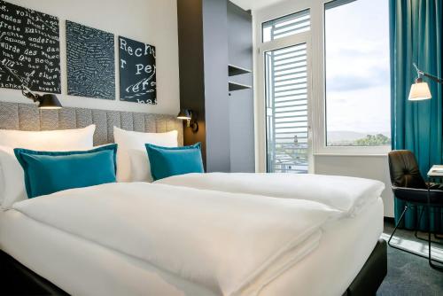 Motel One Karlsruhe - Tap to explore photos