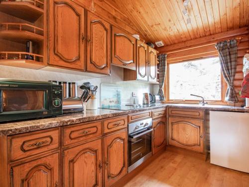 virtuve, Lochside Log Cabin in Golspija