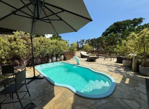 Swimming pool, Casa de Alto Padrao em Guaeca 300m da praia in Praia Do Guaeca