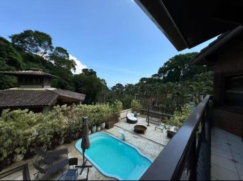 Swimming pool, Casa de Alto Padrao em Guaeca 300m da praia in Praia Do Guaeca