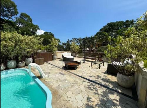 Swimming pool, Casa de Alto Padrao em Guaeca 300m da praia in Praia Do Guaeca