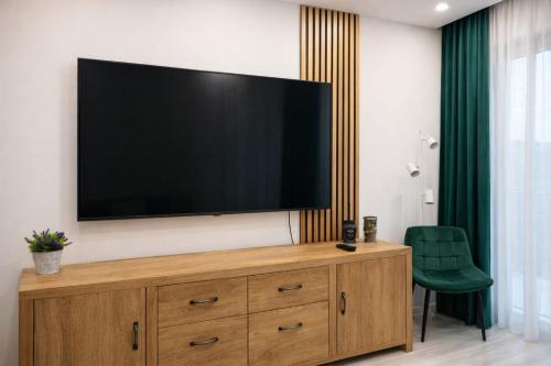 Koplietošanas atpūtas telpa ar TV, Uranus view Apartament in Stefanestii De Jos
