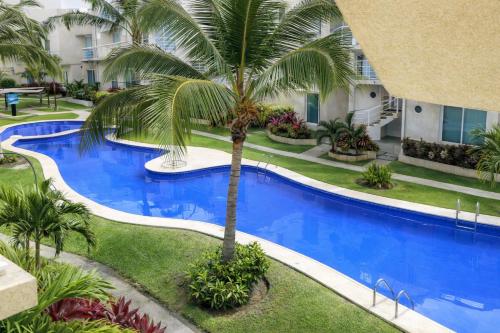 Departamento en Marina Diamante con lago y alberca