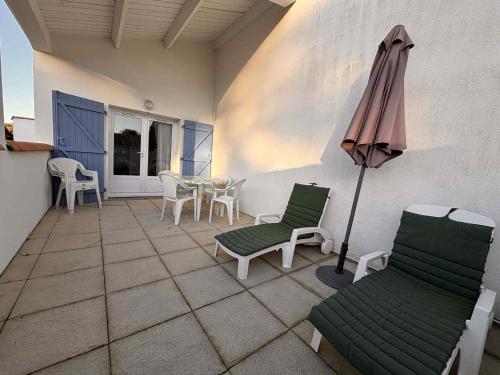 Duplex 3 pièces avec terrasse et parking, proche plage - FR-1-194-307