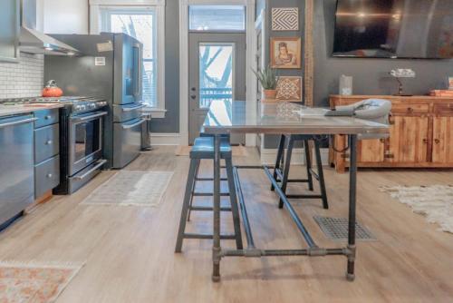 Stylish 4BR with Office Deck Gardens ABODEbucks - image 5