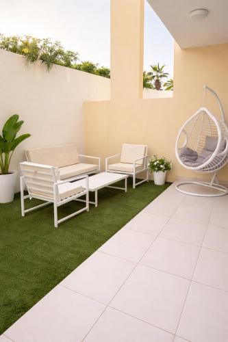 Garden, Damac Hills 2 - Villa Victoria 3BR Townhouse Pool Front & Waterpark in Damac Hills 2