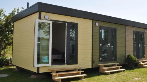 Surf Shack 1 - Zimmer nah am Meer, WLAN, Gemeinschaftsgarten, Surfschule, Naturstrand, Parkplatz, Radfahrweg, Promenade in 10 Minuten erreichbar, Stopover Puttgarden in Dahme, Deutschland