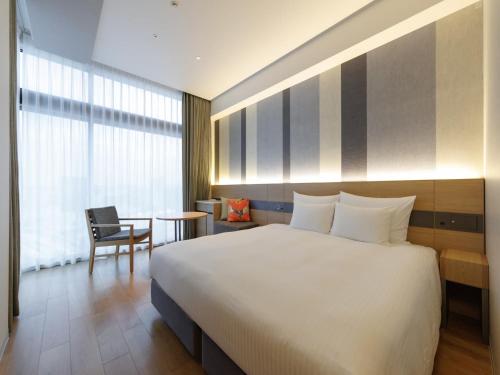 JR KYUSHU HOTEL Blossom Naha Room Type - Deluxe King Room
