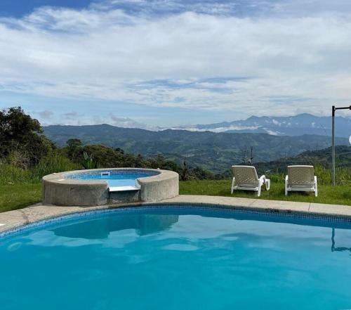 Suite relax entre naturaleza y piscina en Tulipe in Nanegalito