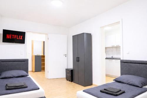LETA Homes - Komfortable FeWo mit Traumbalkon mit flexiblem, Self-Check-In & eigenen Parkplätzen in Straubing, Deutschland