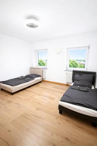 LETA Homes - Zentrale, moderne Wohlfuhlwohnung mit flexiblem, kontaktlosem Zugang & eigenen Parkplat in Plattling