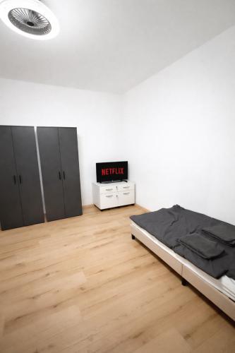 LETA Homes - Zentrale, moderne Wohlfuhlwohnung mit flexiblem, kontaktlosem Zugang & eigenen Parkplat in Plattling