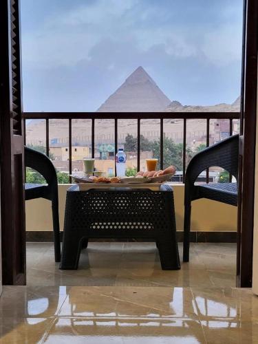 Pirâmides view, Il Cairo