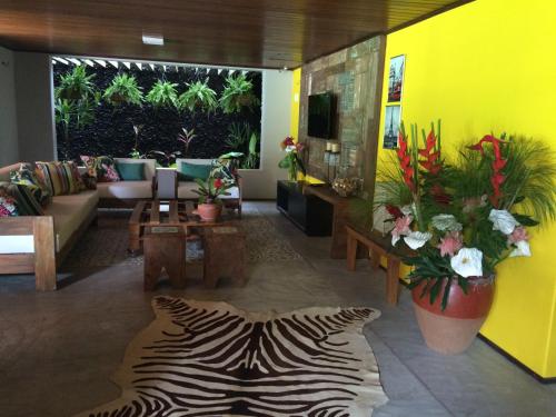 gedeelde lounge/tv-ruimte, Pousada Manjericao in Guaramiranga