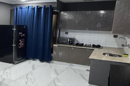 Elite Blue Stylish Private Apartment Bahria Town - main image