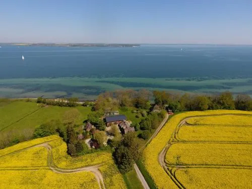 Westscheune am Mühlendamm - Meerblick, Sauna und Ofen in Steinbergkirche, Deutschland