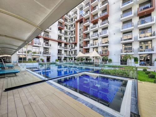Modern Studio in Barsha south with balcony - main image