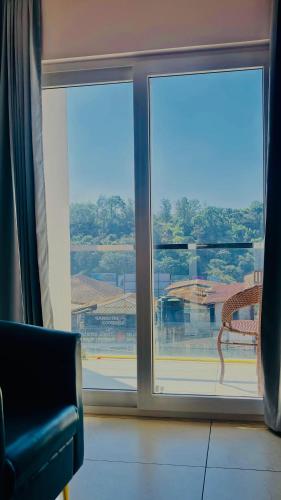 HOTEL EMORA KEYS ,500 Mtrs From Madikeri Fort in Coorg