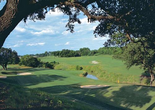 Golf-course getaway with fairway views, pool, WiFi, & central AC in McQueeney (TX)