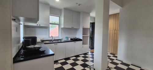 Kitchen, Admiralty Hills Serviced Apartment in Sembawang