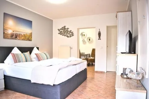 Doppelzimmer 3 Labskaus mit Küche by Pharus Appartements in Ostseebad Koserow, Deutschland