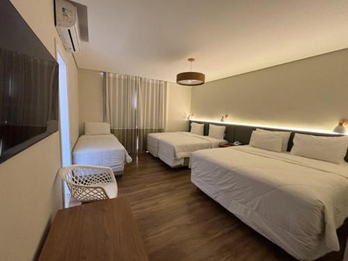 2 queen beds, 1 twin bed