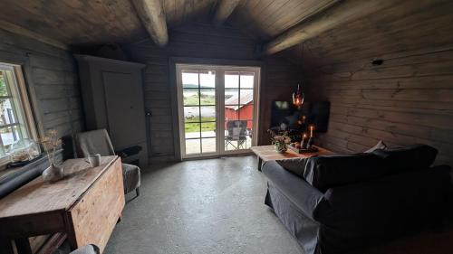 Cabin with sea view, northern lights and midnight sun in Evenes