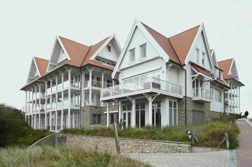 Villa Mer, Sea Breeze - Luxury apartment in Badhuis with wellness facilities and direct seaside loca – khách sạn tại Cadzand-Bad