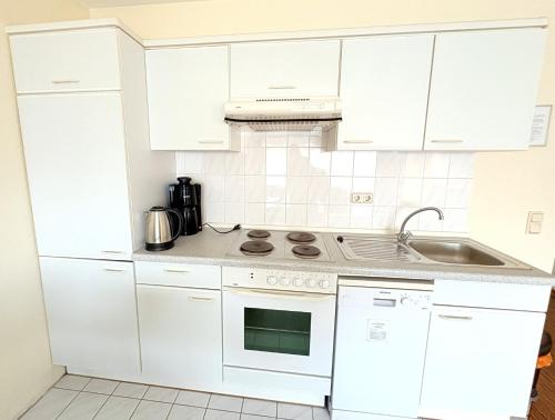 virtuve, Boddenhof Apartment 52 - Balkon, hundefreundlich in Buschvitz