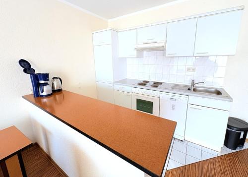 virtuve, Boddenhof Apartment 46 - ebenerdig, tierfreundlich in Buschvitz